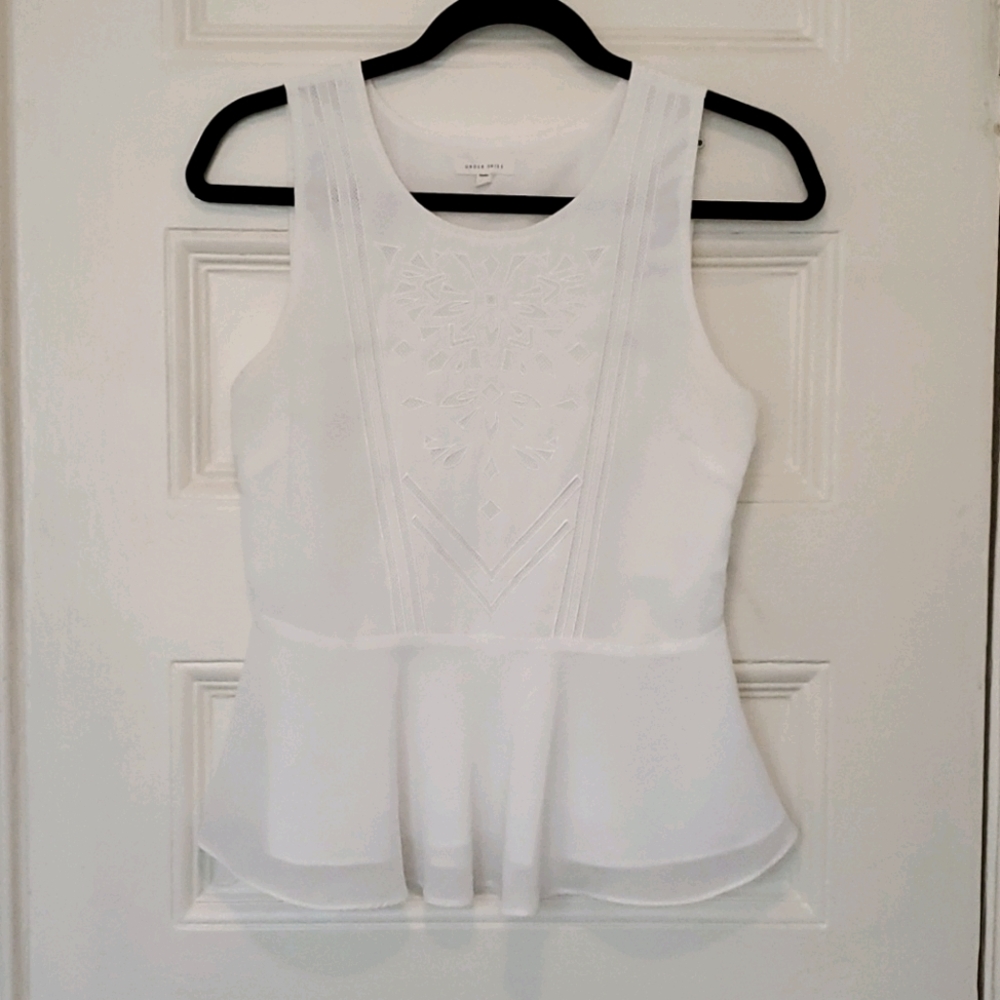 Laser Cut Peplum Top